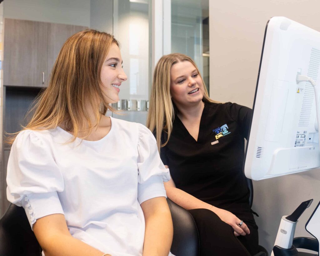 dental hygienist over dental cleaning
